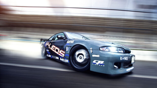 A drifting car showcasing speed and skill on a racing track during a high speed drift