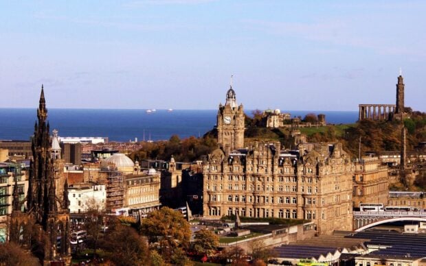 Historic architecture and skyline of Edinburgh Scotland with the sea in the background