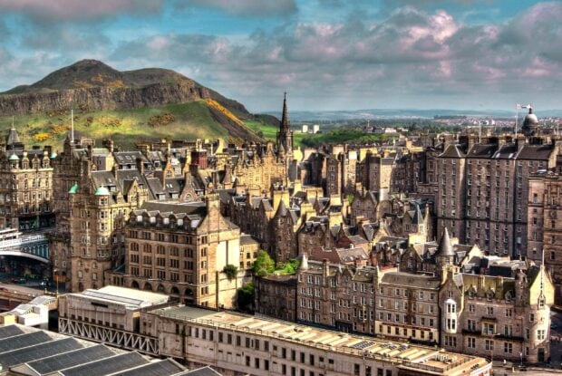 Historic Edinburgh Scotland cityscape with Arthur's Seat in the background