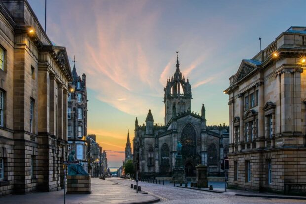 The historic Edinburgh Scotland cityscape featuring the ancient architecture at sunset