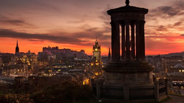 View of Edinburgh Scotland with historic monuments at sunset in high definition