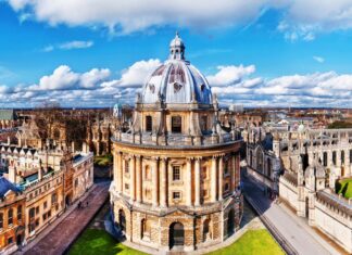 The historic England architecture with the domed building under a bright blue sky