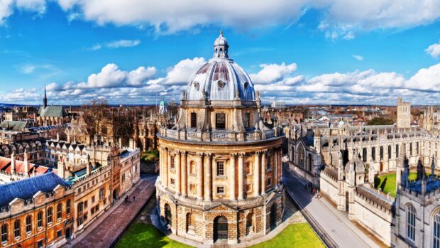 The historic England architecture with the domed building under a bright blue sky