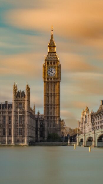 Famous clock tower in England viewed during sunset with clear sky