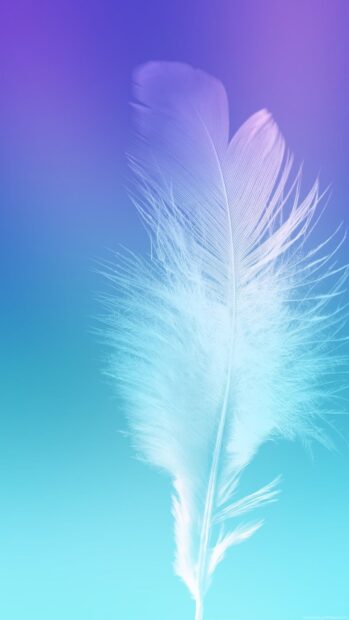 A close up of a soft feather floating against a blue and purple gradient