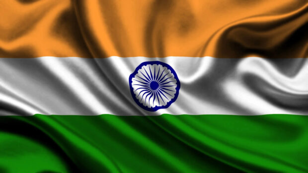 Indian flag with horizontal orange white and green stripes and blue Ashoka Chakra in the center