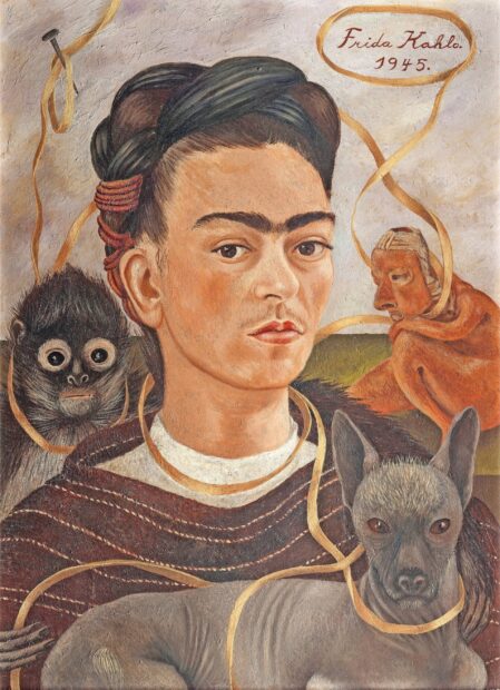 Frida Kahlo painting with a dog monkey and sculpture wrapped in yellow ribbons