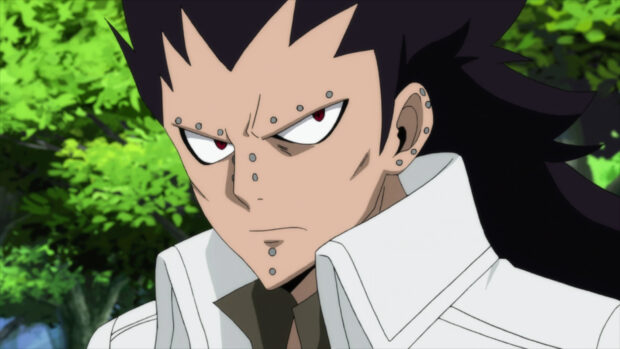 Gajeel Redfox character with facial piercings looking serious outdoors