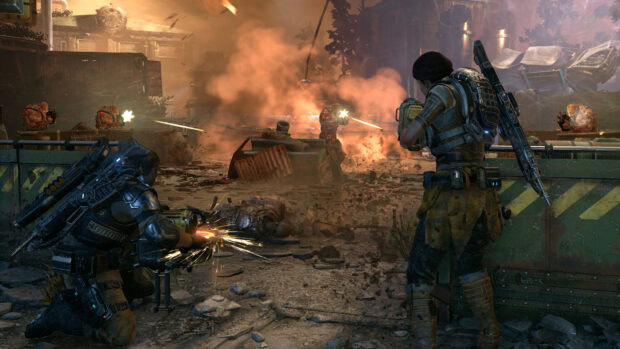Soldiers in Gears of War combat using heavy weapons during intense battle scene