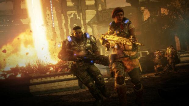 Two Gears of War characters holding weapons in a fiery battle scene