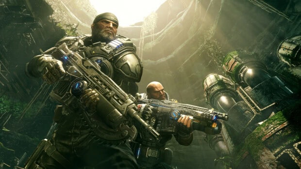 Two soldiers from Gears of War armed with futuristic guns in a mossy underground environment