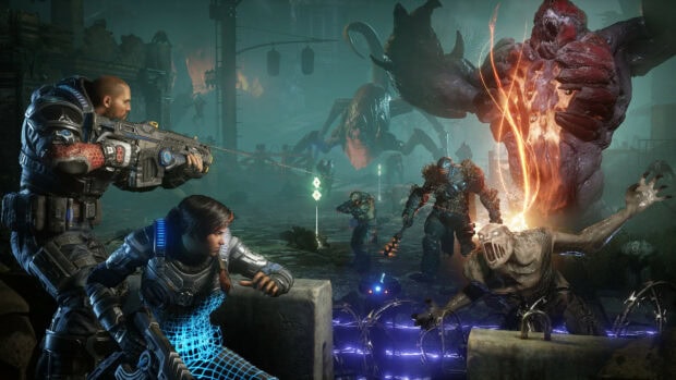 Gears Of War characters fighting against monstrous enemies in a dark post apocalyptic setting