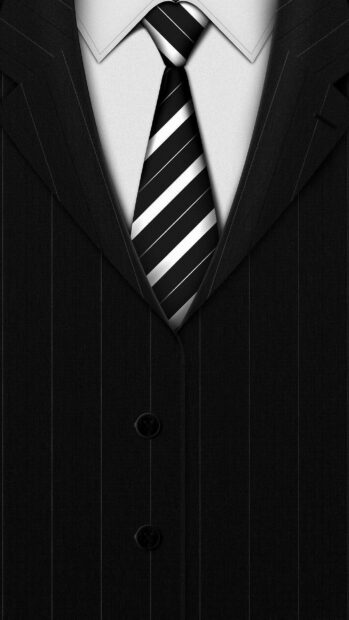 Striped tie on a black pinstripe suit and white shirt showing gentleman style