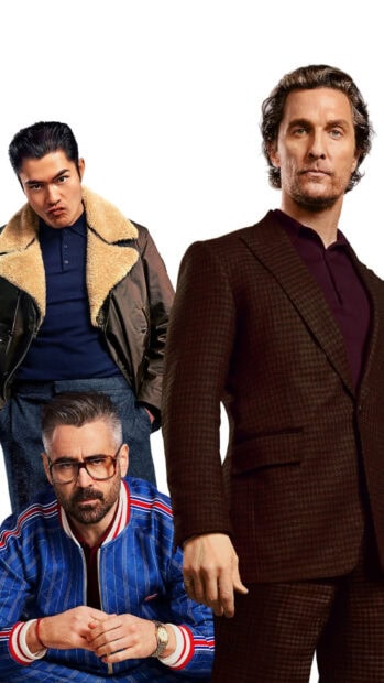 A group of stylish gentleman wearing smart and casual outfits posing confidently