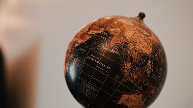 Vintage globe showing the Indian Ocean and surrounding countries in warm tones