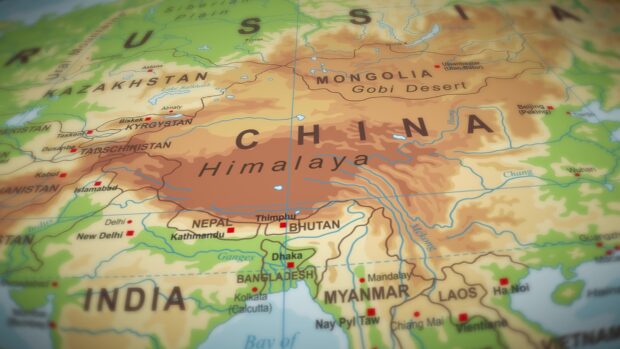 A close up of a geography map showing China Nepal Bhutan and surrounding countries