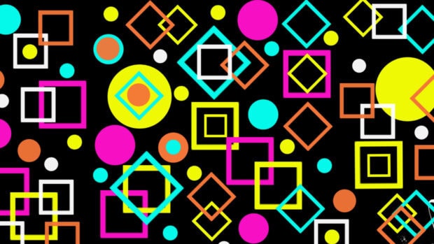 Colorful geometric shapes in various sizes and vibrant colors on a black background