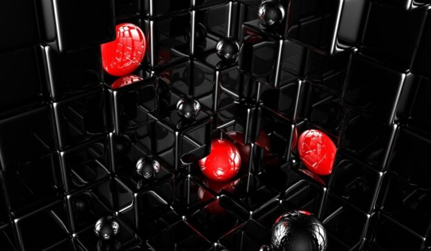A cluster of geometric shapes with glossy black cubes and shiny red spheres forming a futuristic pattern