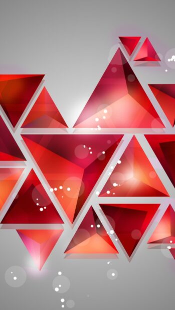 Red geometric shapes creating a vibrant design on a smooth gray background