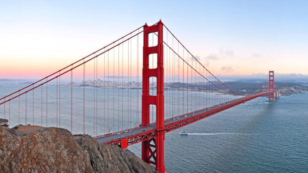 A stunning view of Golden Gate Bridge during sunset over the San Francisco Bay