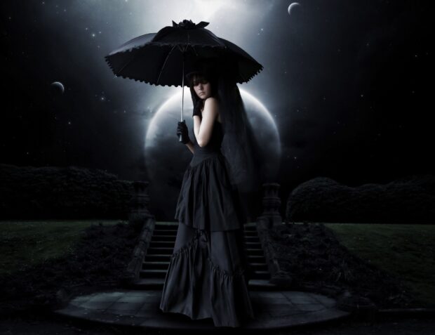 A gothic style woman holding an umbrella standing in front of a moonlit night scene