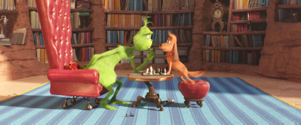 The Grinch playing chess with his dog in a cozy library setting