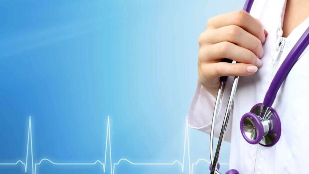 Doctor holding a stethoscope symbolizing health care and medical service