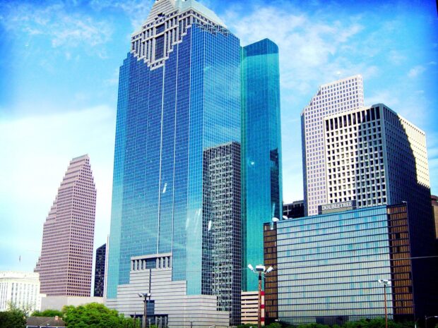 Tall buildings in downtown Houston Texas with clear blue sky