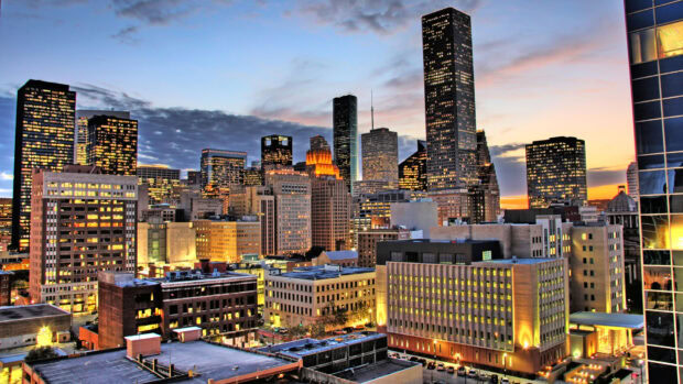Houston skyline at dusk with Texas buildings lighting up the cityscape