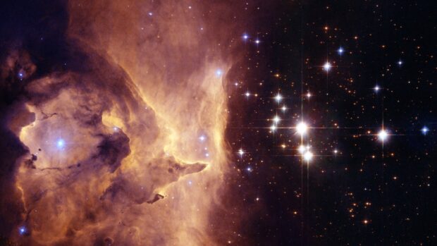 A cosmic nebula cloud with bright stars captured by hubble in deep space