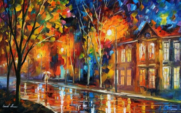 Impressionist scene of colorful autumn trees reflecting on a wet street with a person holding an umbrella