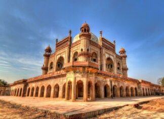 Historic Indian architecture showcasing intricate design and heritage under a clear blue sky