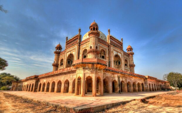 Historic Indian architecture showcasing intricate design and heritage under a clear blue sky