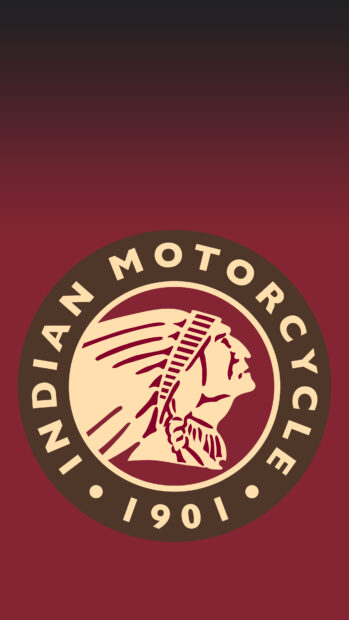 Indian motorcycle emblem with a Native American chief head in a red and brown circular design