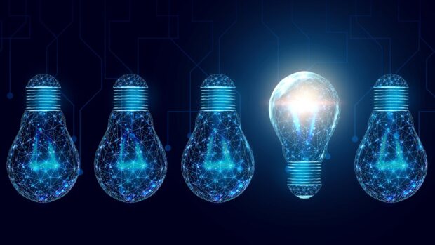 A digital innovation concept with glowing light bulbs formed by connected dots and lines