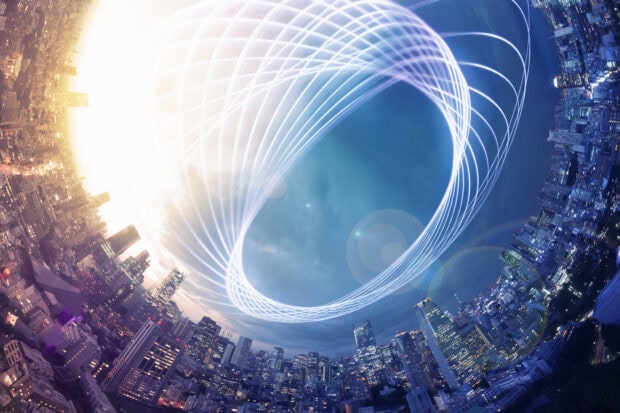 A futuristic cityscape with innovation concept illuminated by swirling light trails over the skyline