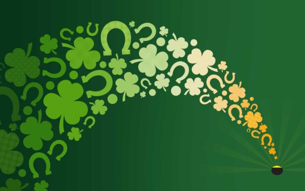 A creative design of shamrock symbols and horseshoes spreading from a pot of gold on a green background