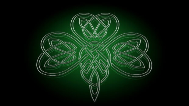Celtic shamrock design with intricate knot patterns in green and black