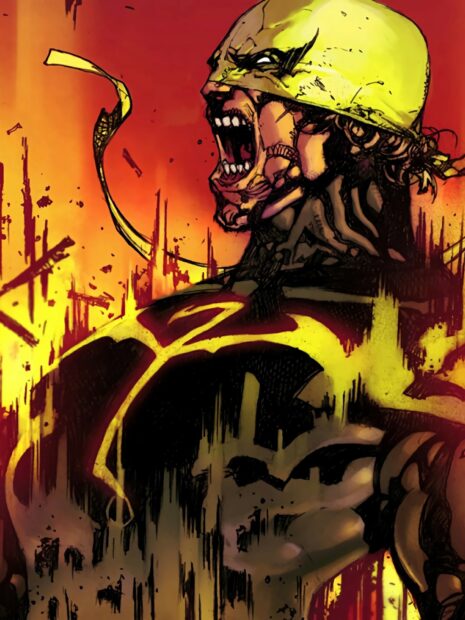 Iron Fist character shouting fiercely with a yellow headband in an intense fiery scene