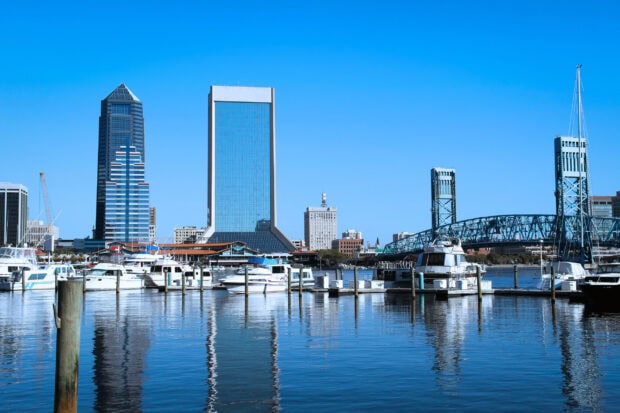 Downtown Jacksonville skyline with boats docked in the marina on a clear day