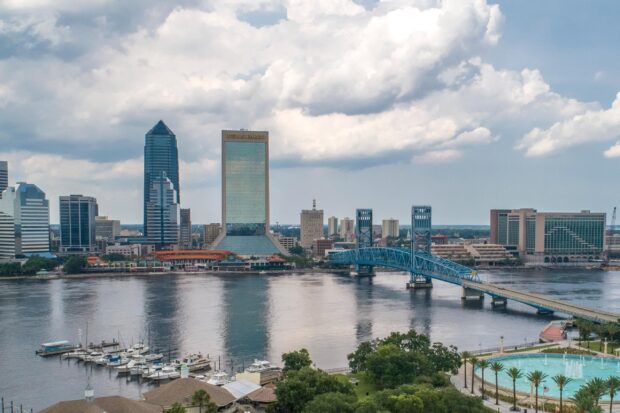 Jacksonville skyline with the blue Main Street Bridge over the river in Jacksonville