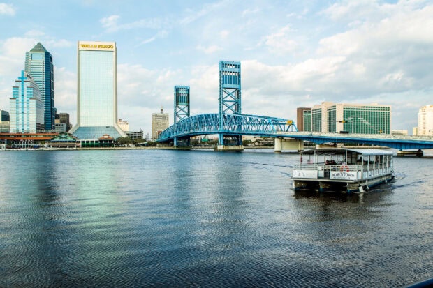 Cityscape featuring Jacksonville skyline and bridge over the river