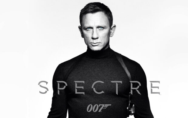 Daniel Craig as James Bond wearing a black turtleneck in Spectre film poster