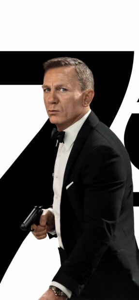 James Bond character holding a gun in a black tuxedo suit James Bond