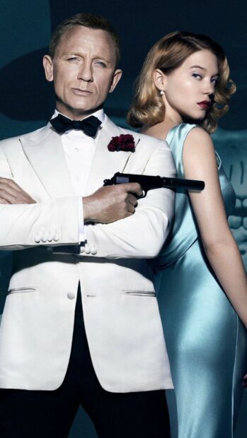 James Bond wearing a white tuxedo holding a gun standing back to back with a woman in a blue satin dress