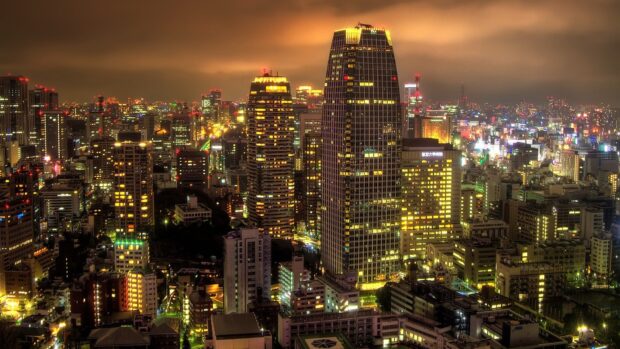 Night view of Japan skyline with illuminated skyscrapers and city lights