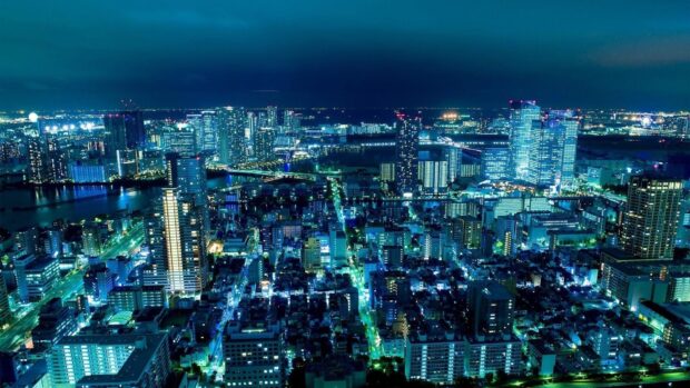 Night view of Japan skyline with illuminated buildings and city lights