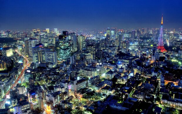 Night view of Japan skyline with Tokyo Tower illuminated and city lights glowing
