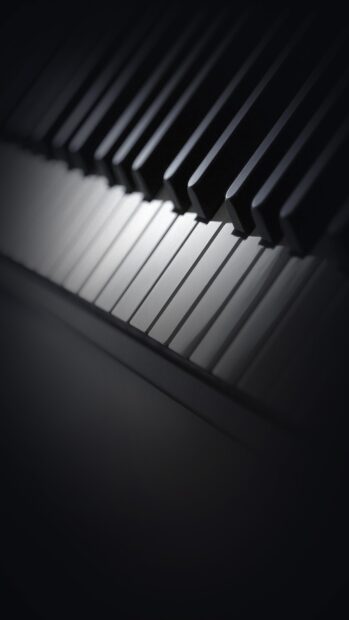 Close up of piano keys jazz instrument in dark setting