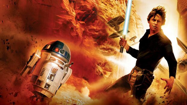 A Jedi wielding a lightsaber standing in a desert canyon near a droid and starfighters flying in the background